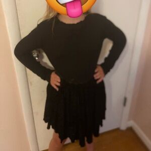 It’s is a black dress in a size Medium 7/8